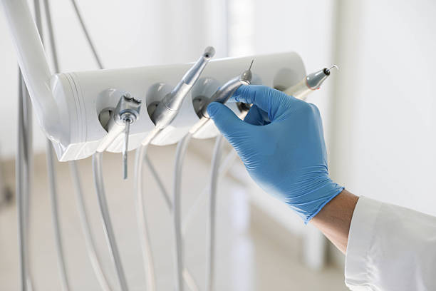 Professional Tooth Extraction technician working in Hide-A-Way Lake, MS